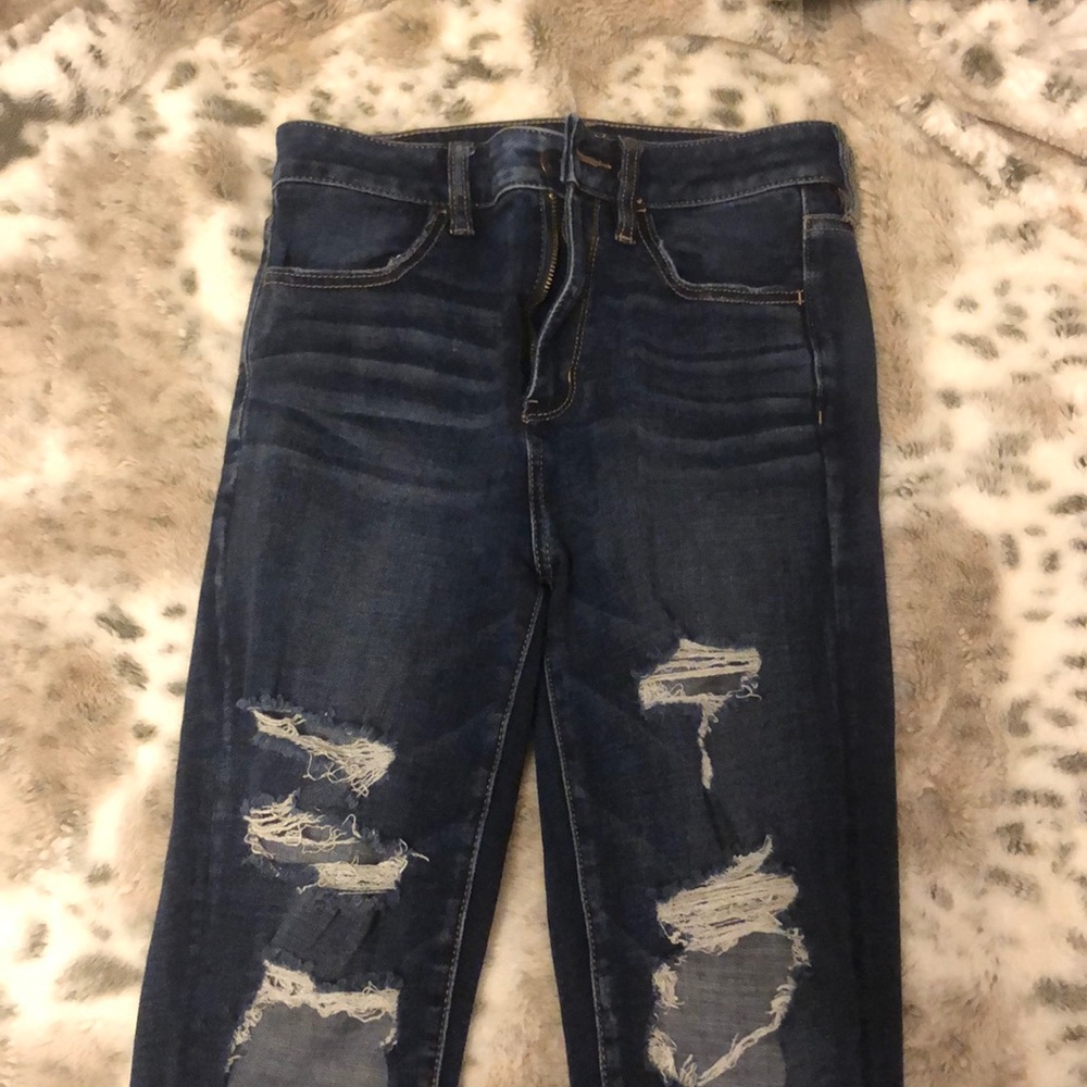 Dark holy skinny jeans